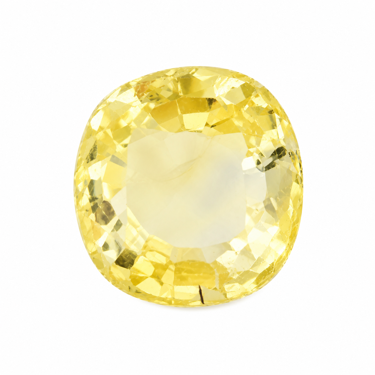 Detailaufnahme eines natürlichen kräftig gelben Saphir, Cushion Mixed Cut, 4,35 ct, zertifizierter Edelstein für hochwertigen Schmuck.