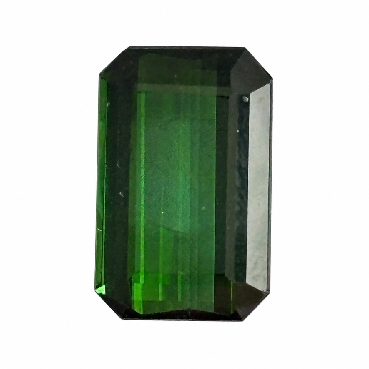 Natürlicher tiefgrüner Verdelith, Oktagon Emerald Cut, 4,87 ct, zertifizierter Edelstein für hochwertigen Schmuck, Detailaufnahme.